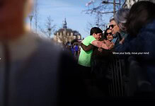 Group of runners and spectators at a running event, with a focus on community and motivation, promoting health and fitness through running.