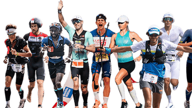 Group of diverse marathon runners in action during a race, showcasing athleticism and determination.